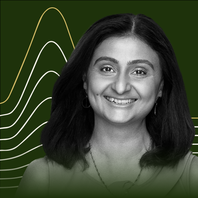 Headshot of Salima Lin on a forest green background. 