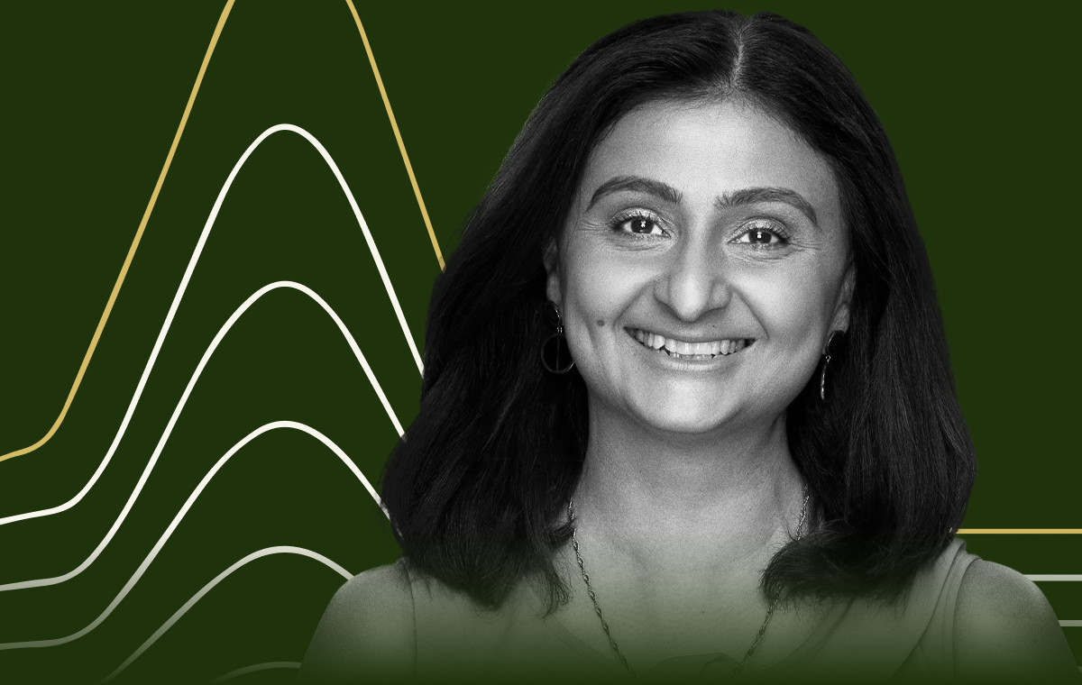 Headshot of Salima Lin on a forest green background. 