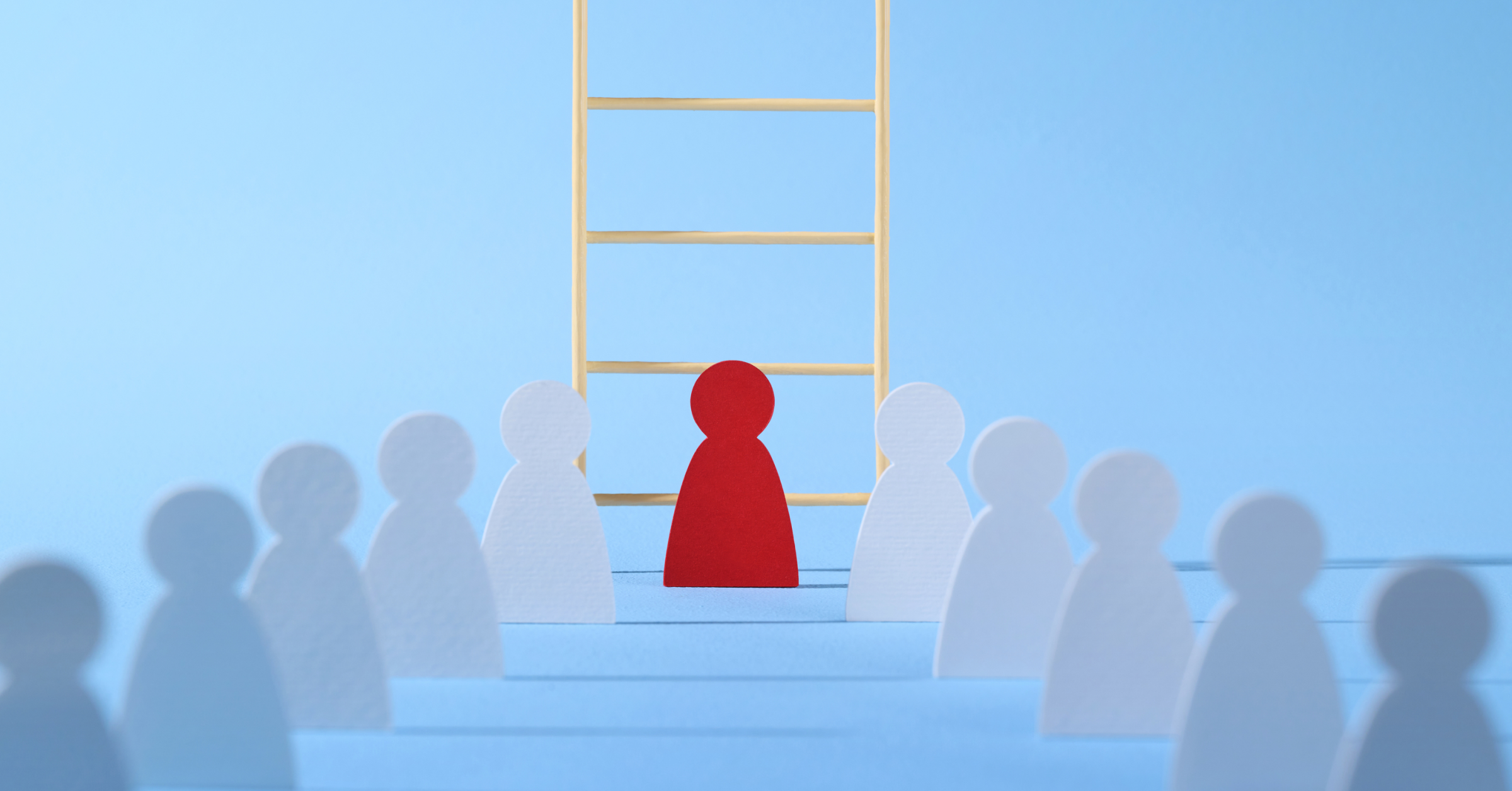 leader in red at the bottom of a ladder with followers behind