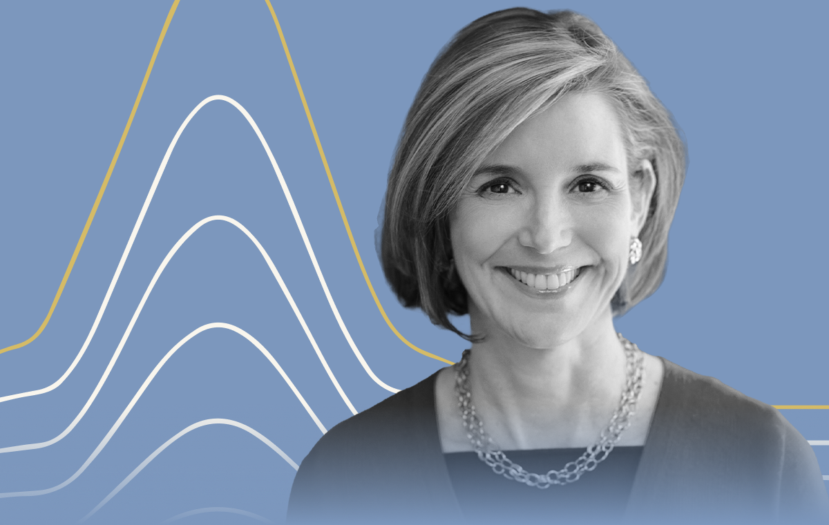Headshot of Sallie Krawcheck on a blue background. 